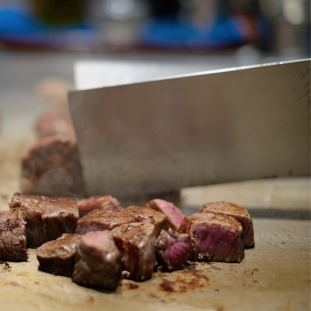 Wedding catering BBQ station with grilled steak